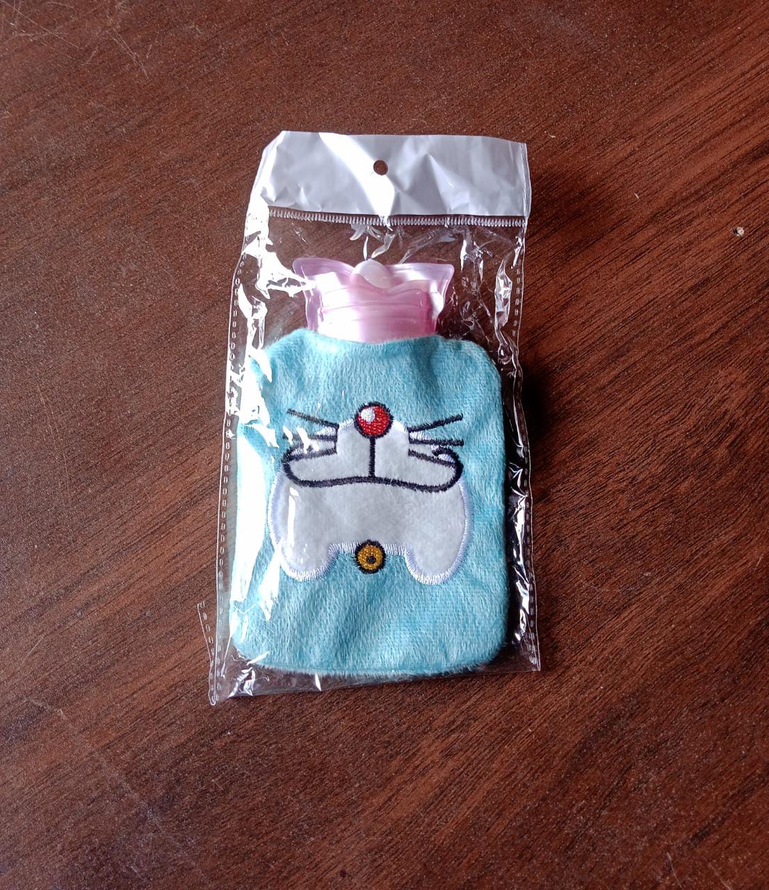 6529 Doremon Cartoon small Hot Water Bag with Cover for Pain Relief, Neck, Shoulder Pain and Hand, Feet Warmer, Menstrual Cramps. 6529 Doremon Cartoon small Hot Water Bag with Cover for Pain Relief, Neck, Shoulder Pain and Hand, Feet Warmer, Menstrual Cramps.